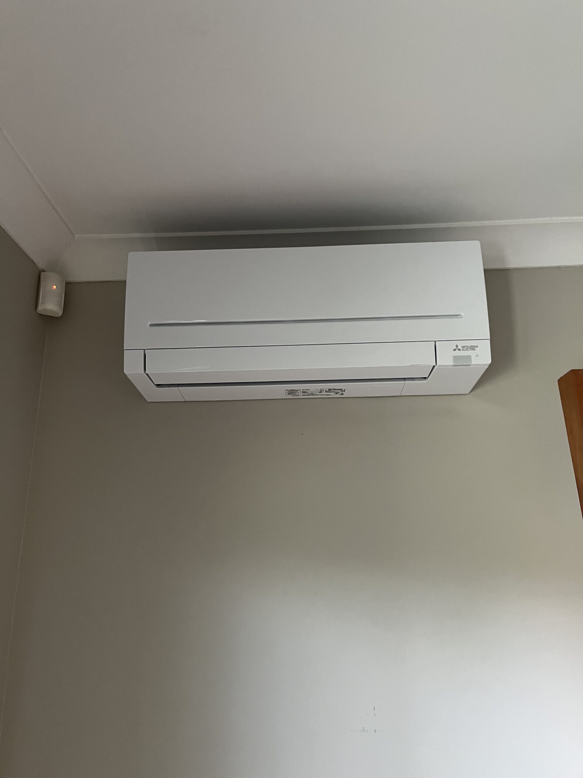 Mitsubishi Electric wall-mounted indoor split system air conditioner unit installed by MyTradie Services Sydney