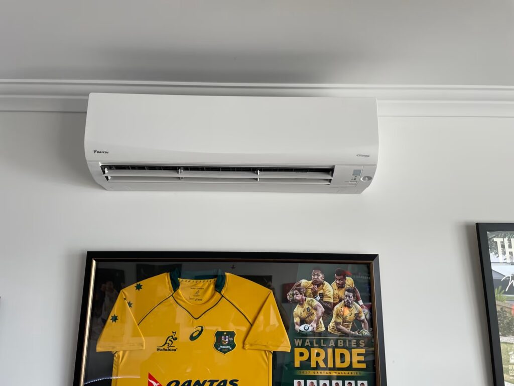 Daikin indoor wall-mounted split system air conditioner unit installed in a residential home by MyTradie Services Sydney