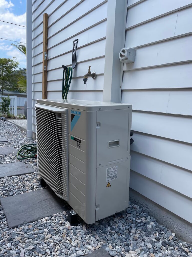 Daikin R32 inverter outdoor split system air conditioner unit installed on mounting feet by MyTradie Services Sydney